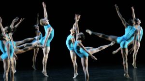 Graceful ballet dancers in synchrony, capturing the fluidity of motion and the beauty of dance.