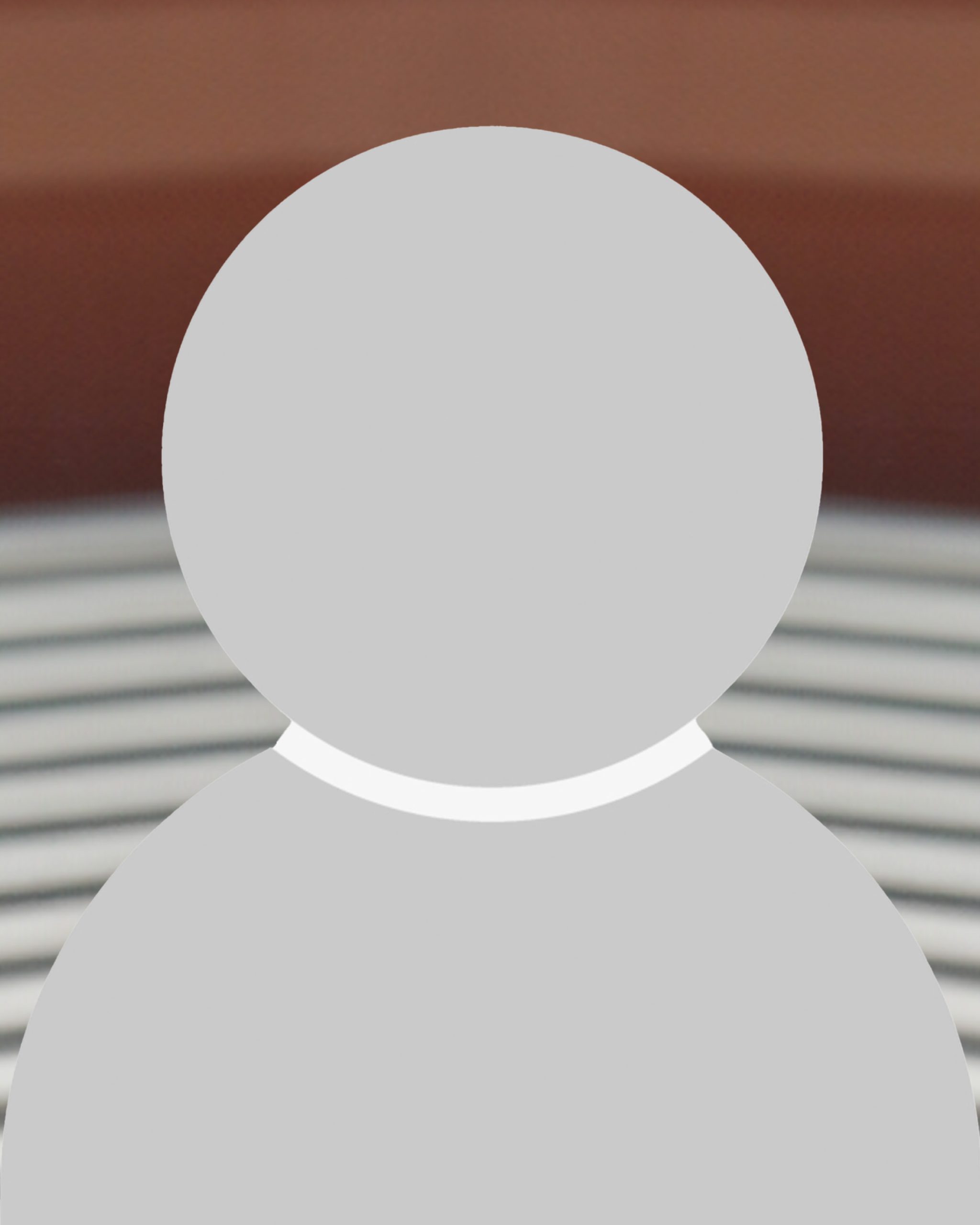 Image with placeholder graphic representing a person, featuring a simple grey silhouette with no distinguishing features, against an indistinct background.