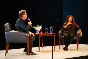 Chaka Khan on stage with the RIAA's Joel Flatow