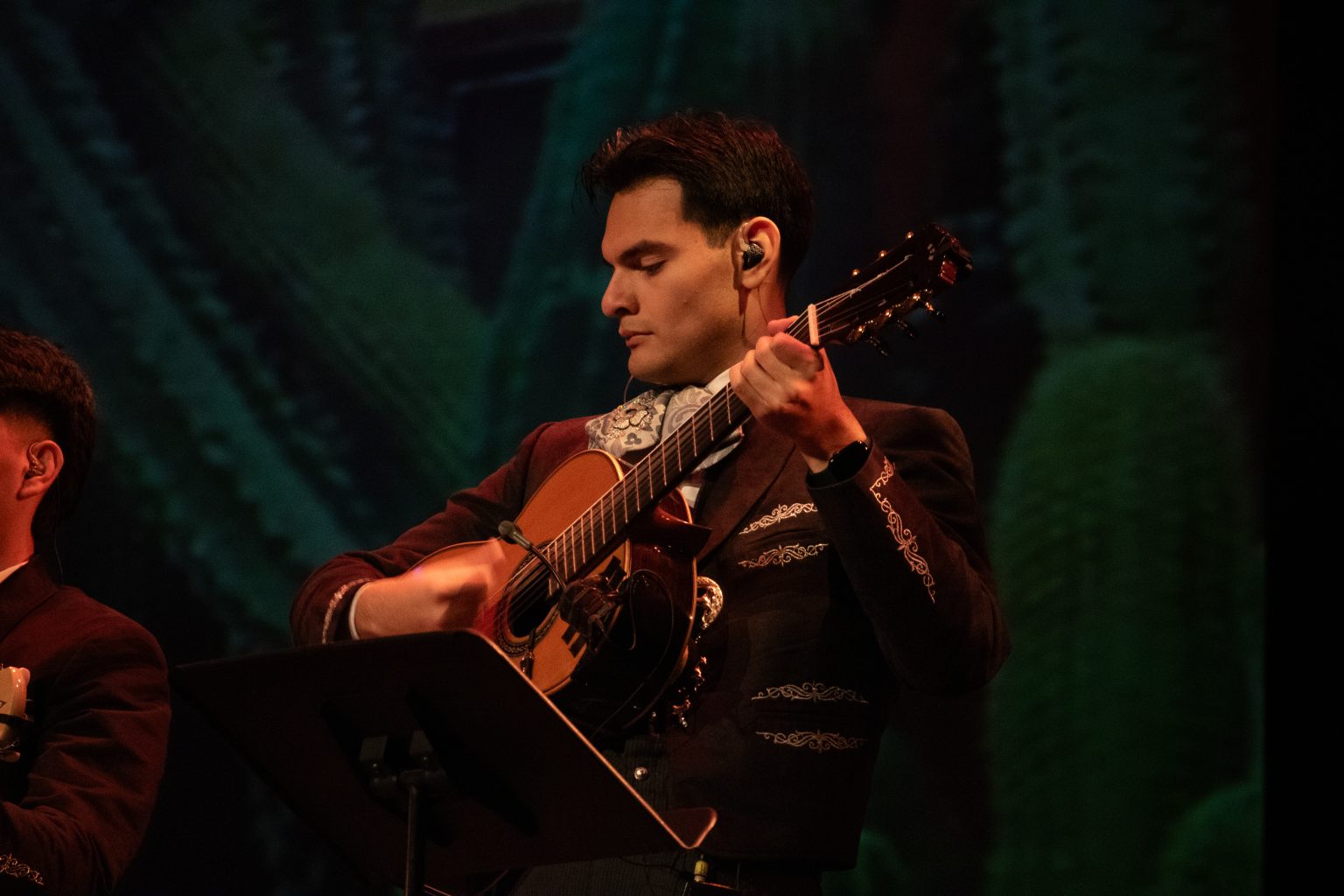 Mariachi guitarist by Wendy Cubillo