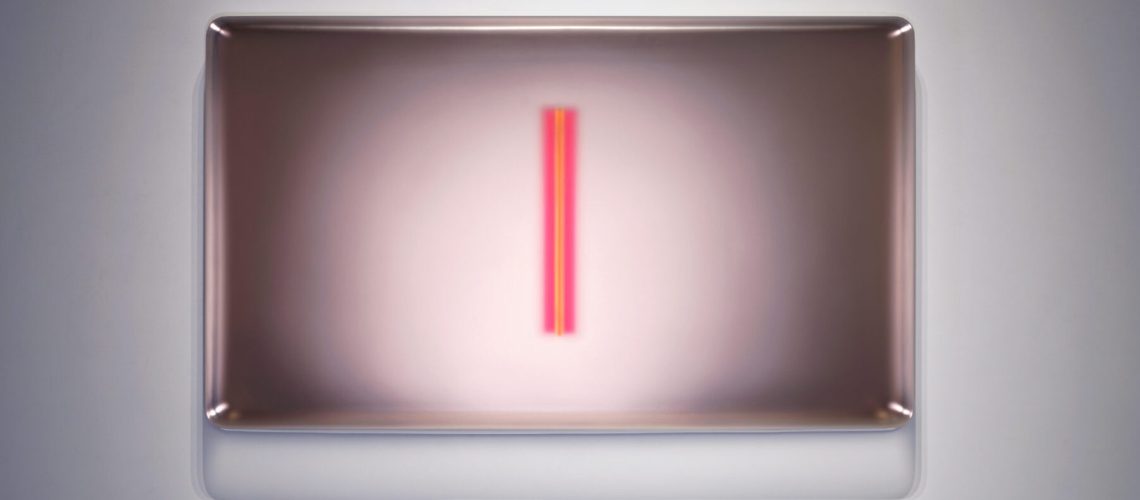 A single pink neon line glows in the center of a minimalist, rectangular lightbox, evoking the hypermodality of Casper Brindle's work.